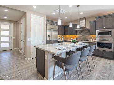 Modern kitchen with stainless steel appliances and granite countertops at 17983 E Vista Desierto --, Rio Verde, AZ 85263