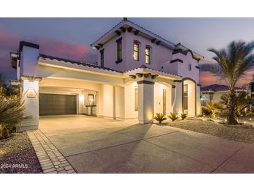 Stunning two-story home with a three-car garage and landscaped front yard at 3799 S Skyline Dr, Gilbert, AZ 85297