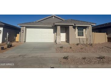 Modern single-story home with attached garage and landscaped front yard at 1018 W Finch Dr, Queen Creek, AZ 85140