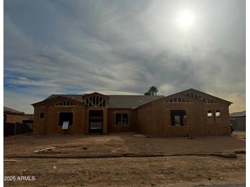 New construction home framing is nearly complete. Landscaping to be completed at 18129 W Rancho Dr # 32, Litchfield Park, AZ 85340