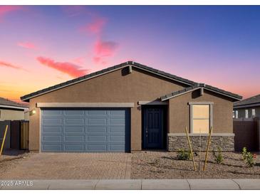 Charming single-story home with a blue garage door and a well-maintained front yard at 4256 W Jeanette Ln, San Tan Valley, AZ 85144