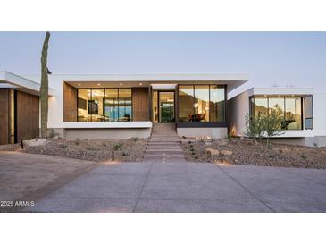 Modern home with inviting front entrance with stairway and desert landscaping at 6623 N Hillside Dr, Paradise Valley, AZ 85253