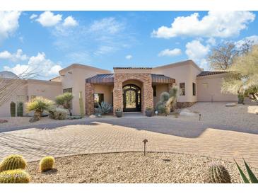 Stunning desert home with a large courtyard and 3-car garage at 10801 E Happy Valley Rd # 27, Scottsdale, AZ 85255