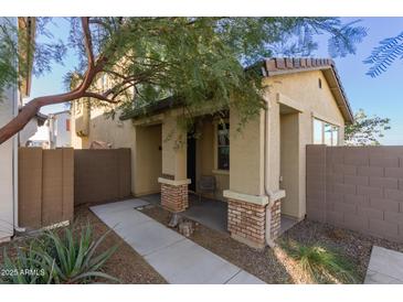 House exterior featuring a covered porch and walkway at 3714 S 58 Dr, Phoenix, AZ 85043
