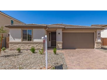 Charming single-story home featuring desert landscaping and a two-car garage at 18792 E Panchito Dr, Gold Canyon, AZ 85118