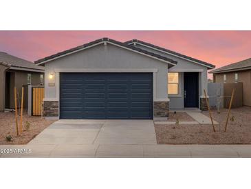 Charming single-Gathering home featuring a two-car garage and neutral colored exterior at 3175 E Hayden Rose Ave, San Tan Valley, AZ 85143