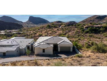 Luxury home with tile roof, nestled in mountain community at 10722 N Skyline Dr, Fountain Hills, AZ 85268