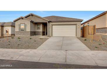 Charming single-Gathering home with a well-manicured front yard and an attached two-car garage at 28250 N 134Th Ave, Peoria, AZ 85383