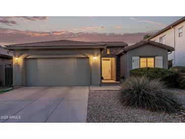 One-story home with two-car garage, landscaping, and neutral color scheme at 5230 W El Cortez Trl, Phoenix, AZ 85083