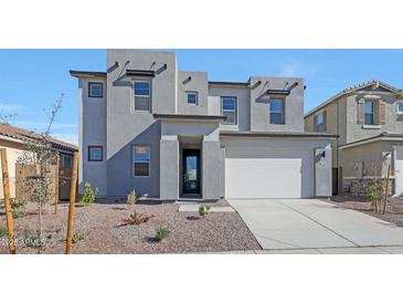 Two-story house with gray exterior, white garage door, and landscaping at 26367 S 231St Way, Queen Creek, AZ 85142
