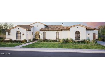 Elegant home featuring a tile roof, manicured lawn, and a welcoming entrance, all bathed in warm, natural light at 6621 E Doubletree Ranch Rd, Paradise Valley, AZ 85253