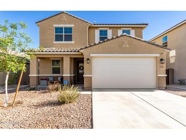 Charming two-story home with a well-maintained front yard and a two-car garage at 4488 W Charlie Dr, San Tan Valley, AZ 85144