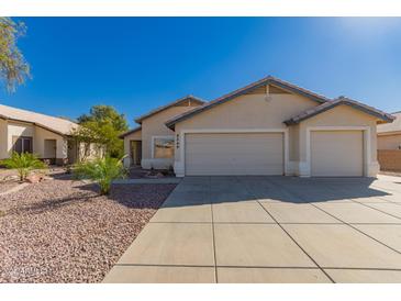 Charming single-story home with a two-car garage and low-maintenance desert landscaping at 8549 W El Caminito Dr, Peoria, AZ 85345