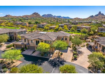 Two-story home with private driveway and desert landscaping at 10260 E White Feather Ln # 2035, Scottsdale, AZ 85262