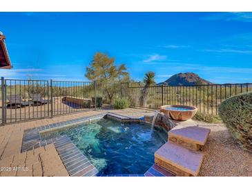 Inviting spa and pool with mountain views; a perfect desert retreat at 27440 N Alma School Pkwy # 101, Scottsdale, AZ 85262