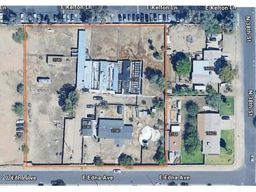 Aerial view showing house, yard, and surrounding area at 3740 E Edna Ave, Phoenix, AZ 85032