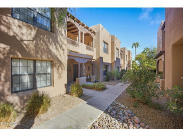 Spanish-style building exterior with walkway and landscaping at 12438 N Saguaro Blvd # 126, Fountain Hills, AZ 85268