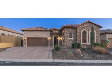 Stunning stone elevation, 2-car garage, & landscaped yard at 8537 E Leland St, Mesa, AZ 85207