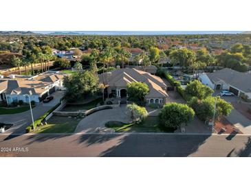 Luxury home with expansive grounds, pool, and sports court at 2549 E Cherrywood Pl, Chandler, AZ 85249