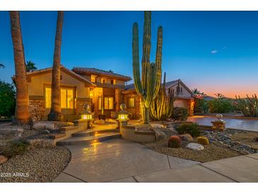 Stunning desert landscape surrounds this single-story home with a 3-car garage at 17409 N Horseshoe Dr, Surprise, AZ 85374