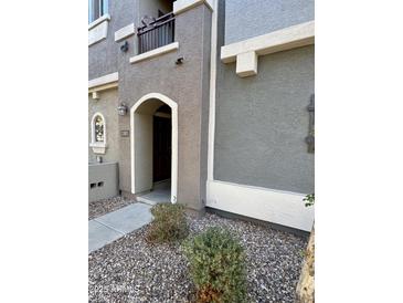 Inviting exterior of townhome with attractive landscaping at 280 S Evergreen Rd # 1301, Tempe, AZ 85288