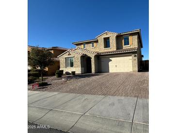 Charming two-story home with stucco exterior, tile roof, and a two-car garage at 2738 E Cherry Hill E Dr, Gilbert, AZ 85298