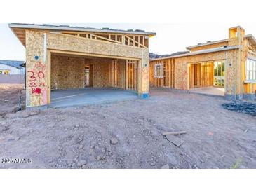 New home construction showing exterior framing and garage at 7577 W Evans Dr, Peoria, AZ 85381