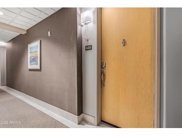 Residential hallway with carpeting and neutral walls at 16 W Encanto Blvd # 609, Phoenix, AZ 85003