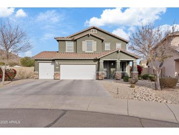 Two-story house with a three-car garage and desert landscaping at 4642 W Alabama Ln, San Tan Valley, AZ 85144