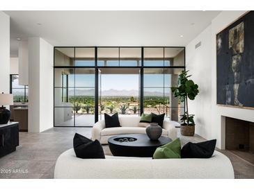 Bright living room with city views and modern furniture at 5939 E Quartz Mountain Rd, Paradise Valley, AZ 85253