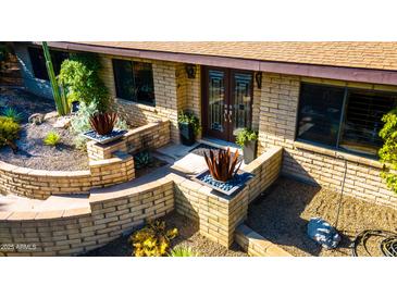 Inviting front entrance with double doors and landscaped walkway at 7830 E Carefree Estates Cir, Carefree, AZ 85377