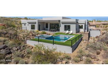 Beautiful backyard pool and spa of home with desert landscaping and mountain views at 15214 N Elena Dr, Fountain Hills, AZ 85268