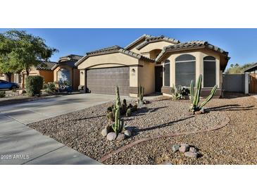 One-story house with desert landscaping and two-car garage at 17124 N Melissa Ln, Surprise, AZ 85374