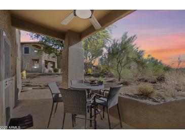 Enjoy sunsets from your private patio, featuring a bistro set at 8880 E Paraiso Dr # 108, Scottsdale, AZ 85255