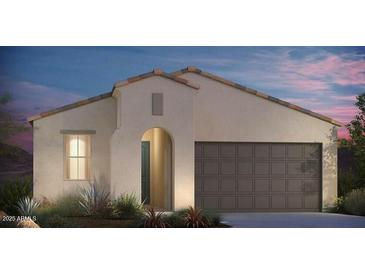 One-story home with Spanish-style architecture, brown garage door, and landscaping at 18111 W Hiddenview Dr, Goodyear, AZ 85338