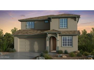 Two-story house with a beige exterior, brown roof, and a two-car garage at 7820 E Quintana Ave, Mesa, AZ 85212