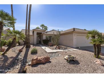 Single story home with desert landscaping and walkway at 9637 E Sundune Dr, Sun Lakes, AZ 85248