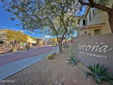 Private community entrance with landscaping and signage at 10055 N 142Nd St # 1310, Scottsdale, AZ 85259