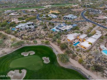 Luxury home with pool and golf course views at 9821 E Sundance Trl, Scottsdale, AZ 85262