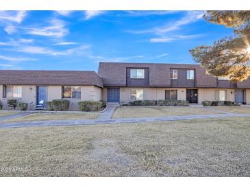 Attractive exterior of a two-story townhome with landscaping at 1732 E Baker Dr, Tempe, AZ 85282