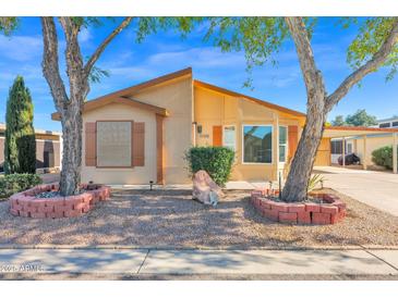 Single-story home with landscaped yard and carport at 8500 E Southern Ave # 509, Mesa, AZ 85209