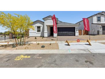 Charming single-story home featuring a modern design and inviting curb appeal at 2324 W Moody Trl, Phoenix, AZ 85041