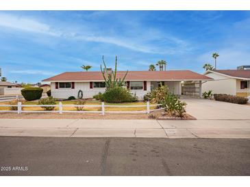 Ranch style home with carport and landscaped front yard at 501 W Linda Ln, Chandler, AZ 85225