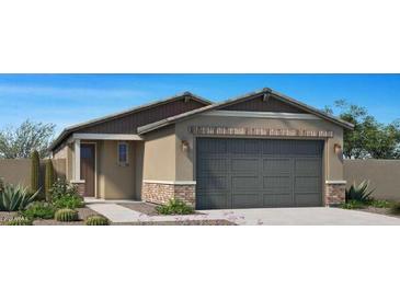 Single-story home with two-car garage and desert landscaping at 13171 N 145Th Ln, Surprise, AZ 85379