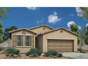 One-story home with tan exterior, tile roof, and landscaping at 18202 W Cielo Grande Ave, Surprise, AZ 85387