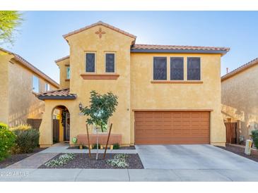 Two-story house with a large garage and well-manicured front yard at 25719 N 54Th Dr, Phoenix, AZ 85083