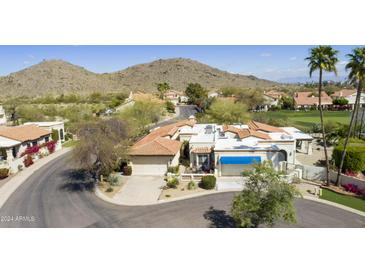 Luxury home community nestled against mountain backdrop, offering stunning views and a serene atmosphere at 4602 E Monte Way, Phoenix, AZ 85044