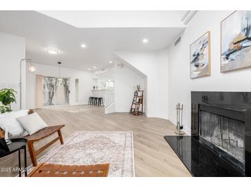 Open living area with hardwood floors at 8829 S 51St St # 3, Phoenix, AZ 85044