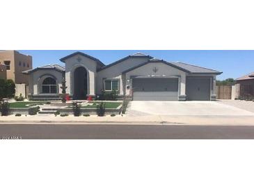 Beautiful two-story home with landscaped yard and fountain at 3216 W Melody Dr, Laveen, AZ 85339