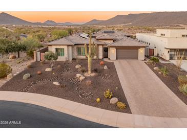 Stunning desert home with a large backyard and a beautiful mountain view at 11842 W Creosote Dr, Peoria, AZ 85383